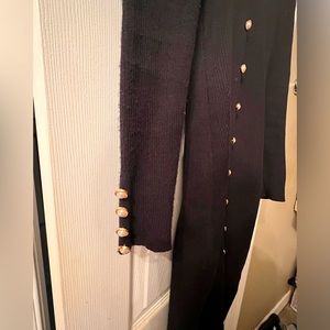 Long button sleeved black sweater dress